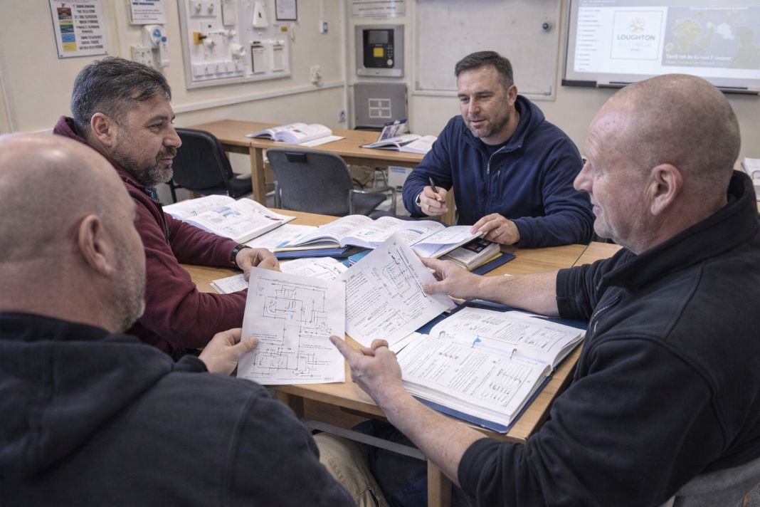 AI image of electrical trainees in classroom discussion