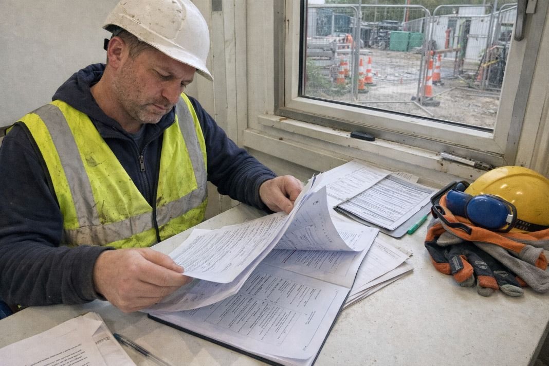 AI image of focused worker at construction site office